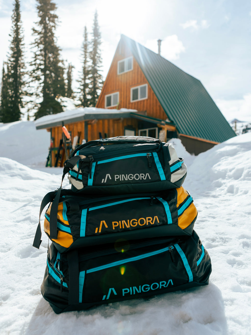 Pingora Radia travel duffel showing all three sizes