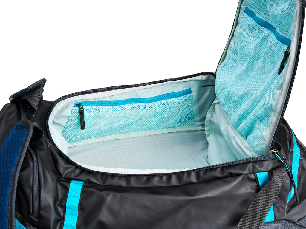 Pingora Radia travel duffel showing large u-zipper opening with mesh pocket