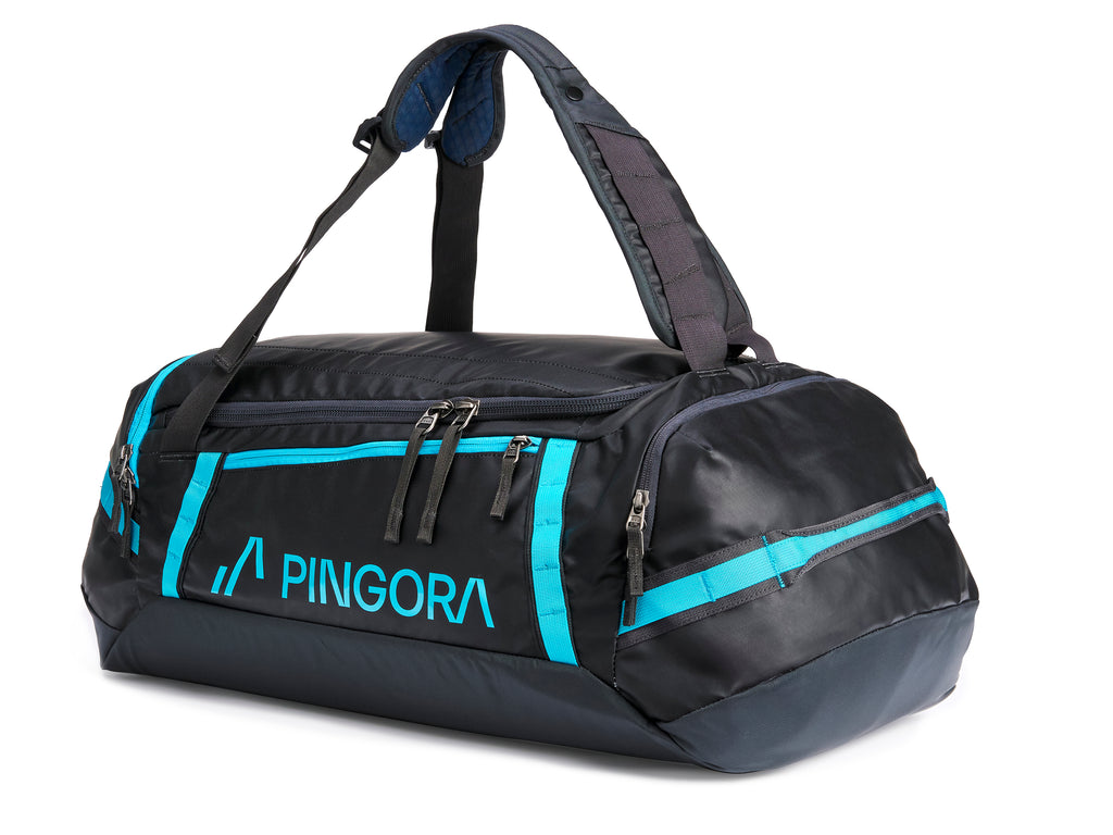 Pingora Radia travel duffel in black back view showing harness straps