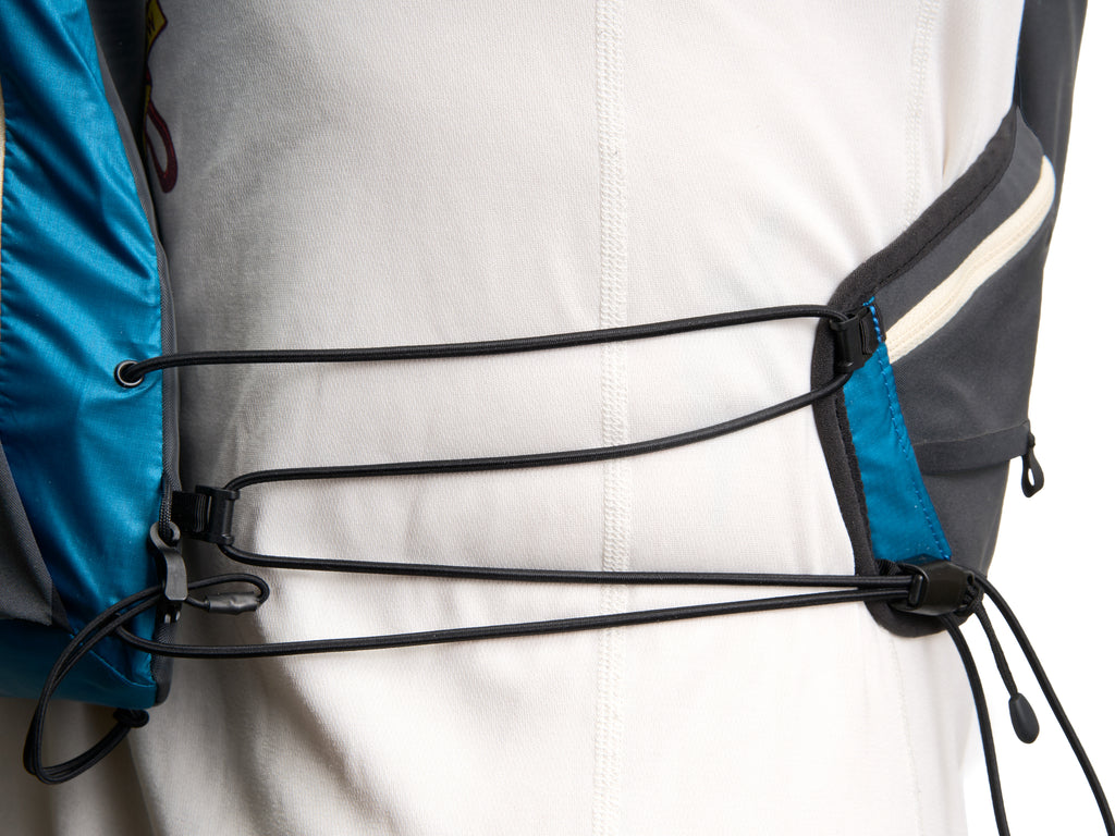 Pingora Flow trail running backpack showing adjustable lashing for a greeat fit