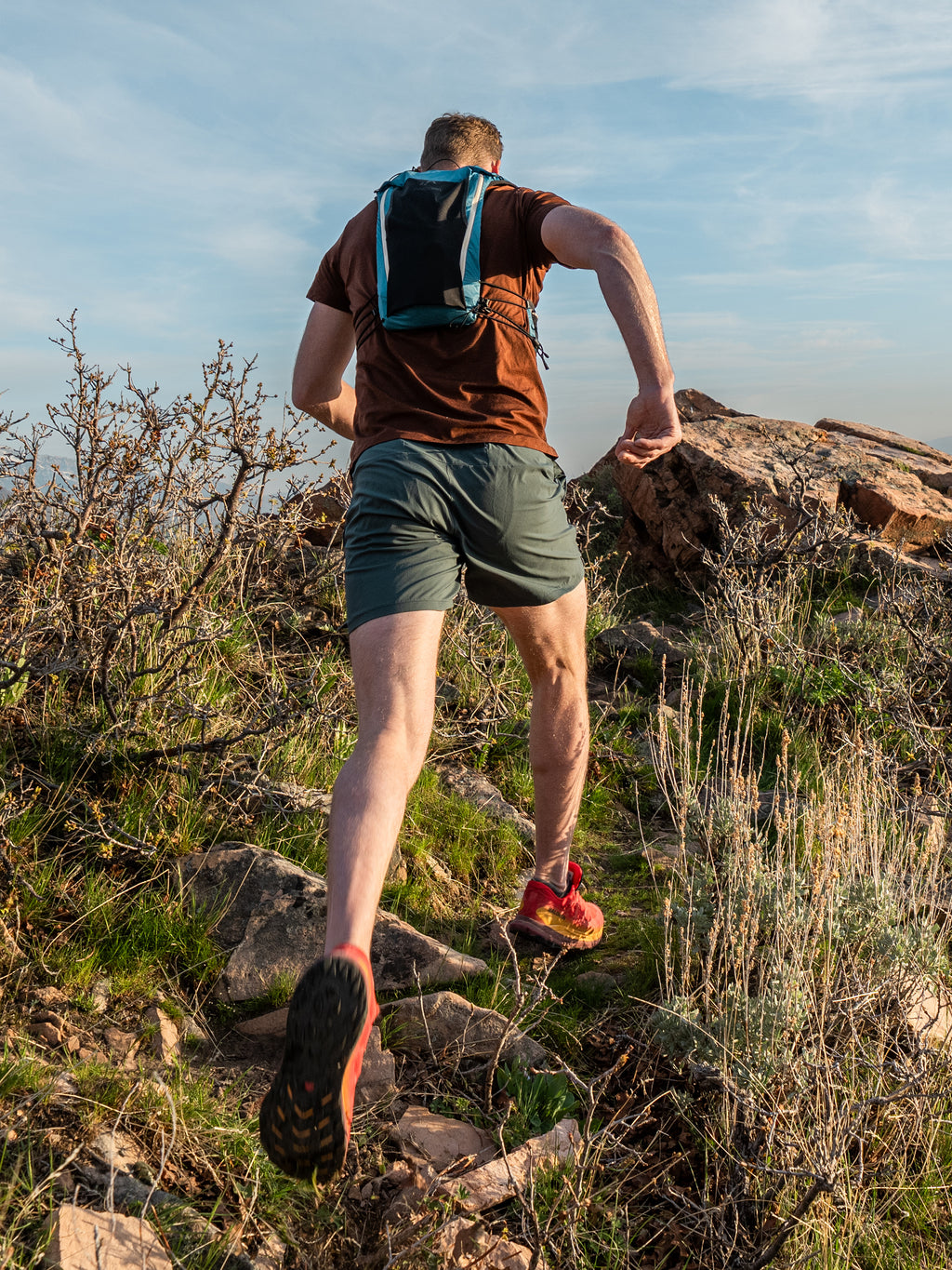 Pingora Flow trail running backpack in blue color on model