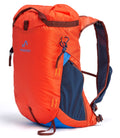 A Pingora Focus 15 liter red and blue climbing backpack with multiple zippers and side straps.