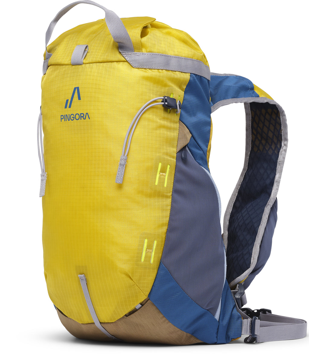 A Pingora yellow and blue climbing and hiking backpack with multiple zippers and side straps.