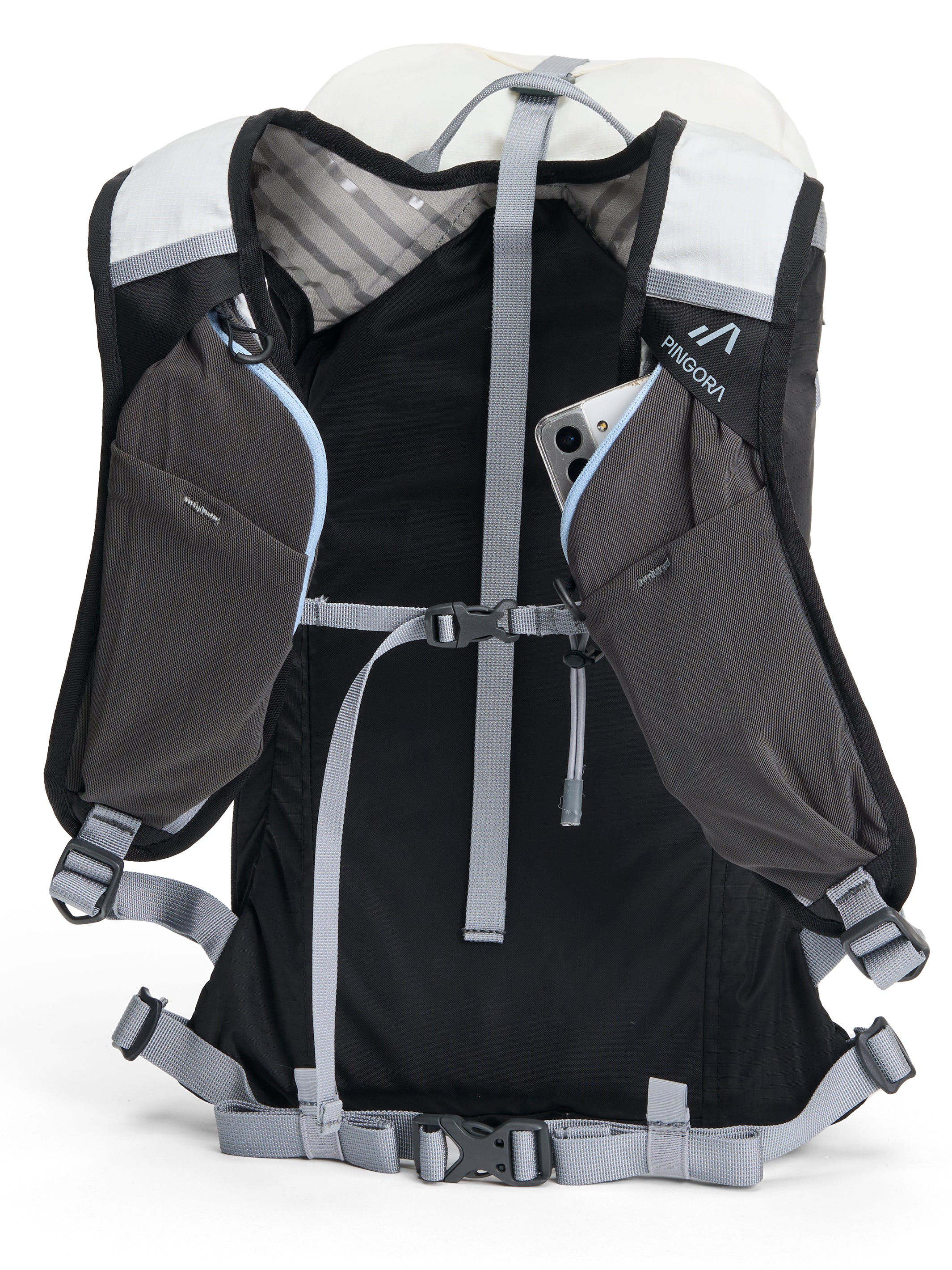 Pingora Focus 15 liter climbing and hiking backpack in white and black showing the back panel and harness pockets.