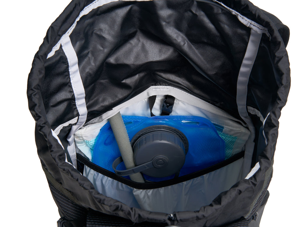 Pingora Focus 25L hiking and climbing backpack showing how a hydration bladder works inside the pack.