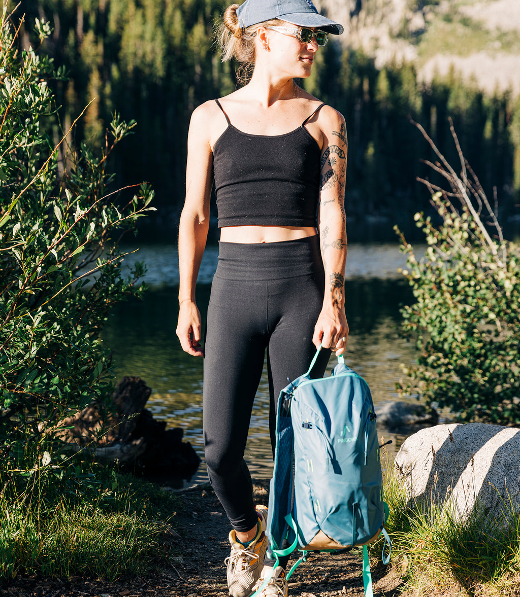 Pingora Lucid 13L Hiking Backpack harness view showing size relative to a live model.