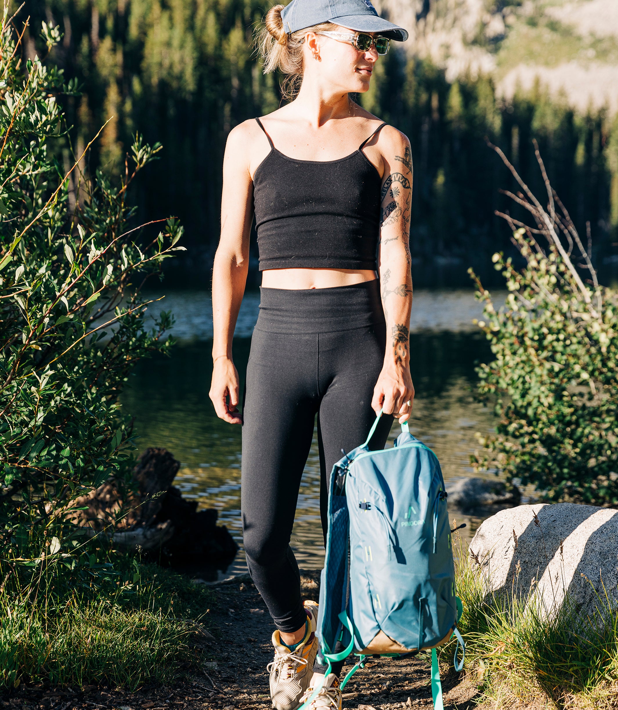 Pingora Lucid 13L Hiking Backpack harness view showing size relative to a live model.