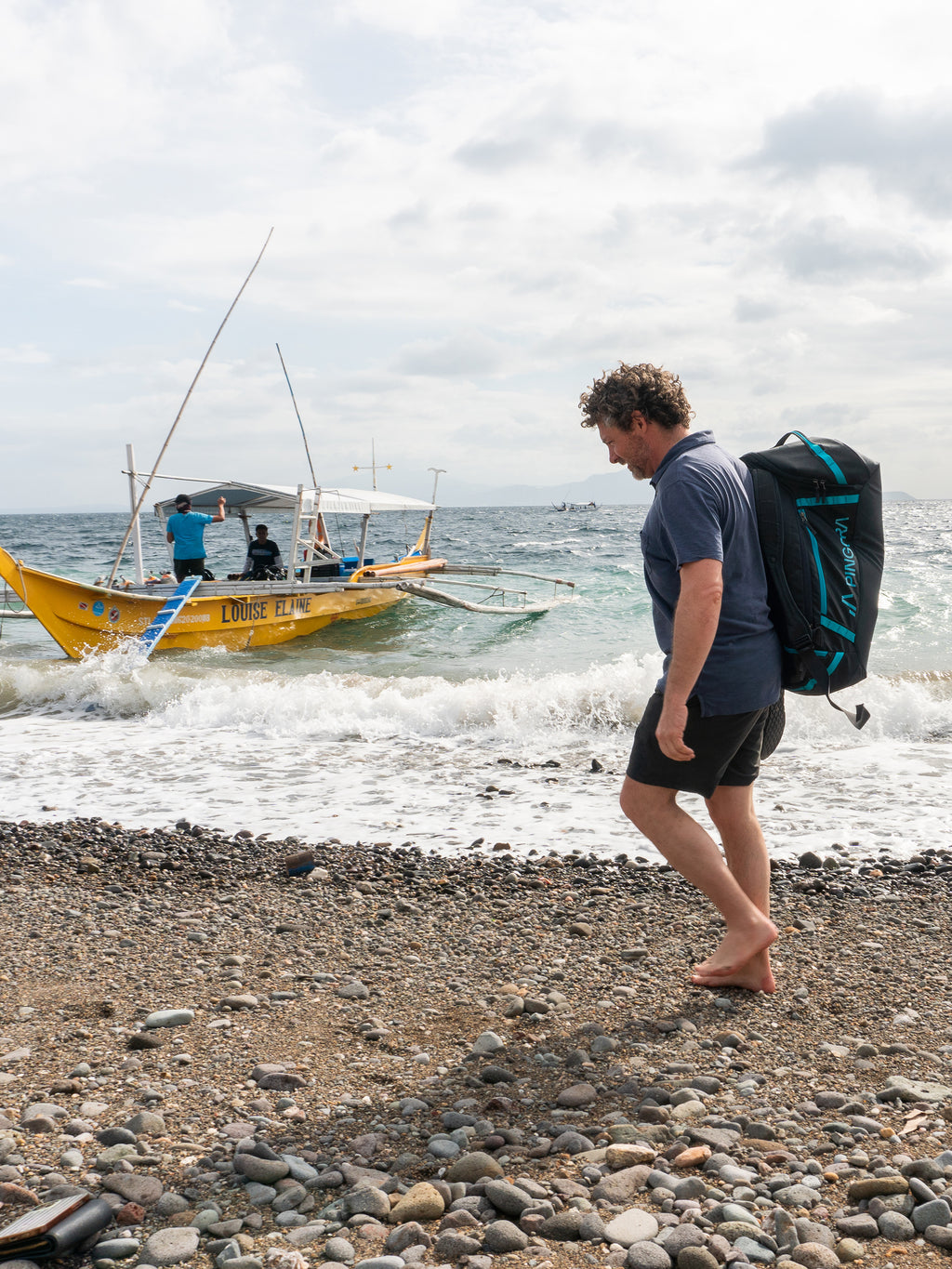 Pingora Radia travel duffel  on model with harness carry