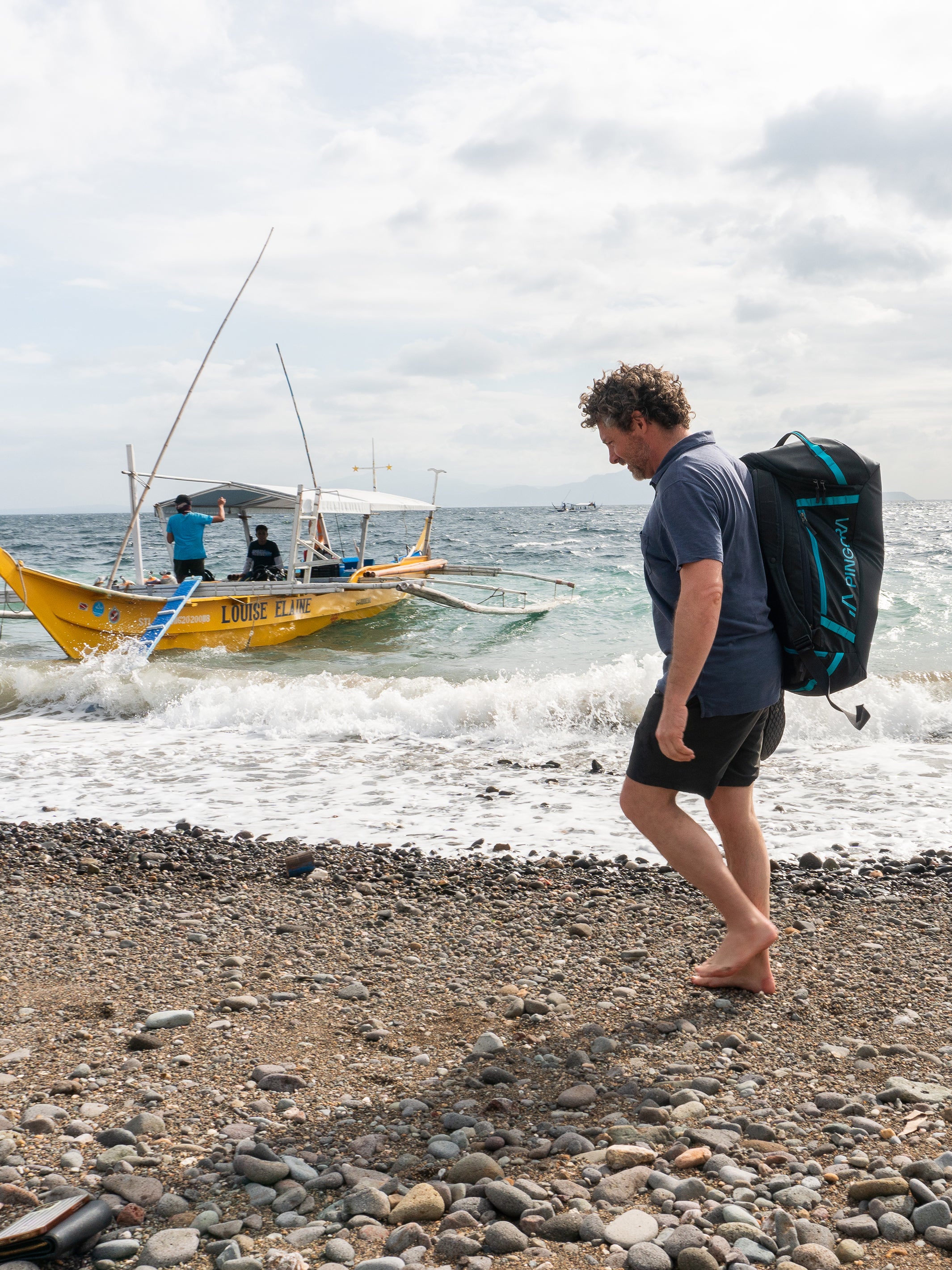 Pingora Radia travel duffel  on model with harness carry