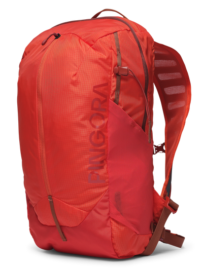 Image of the orange Remote Z 20 liter zippered backpack. Perfect daypack for hiking, includes hydration, medium size day pack.